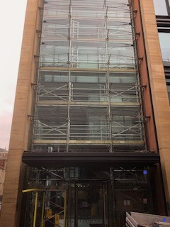 Linked Tower scaffold with gated frames to allow access through the working levels.